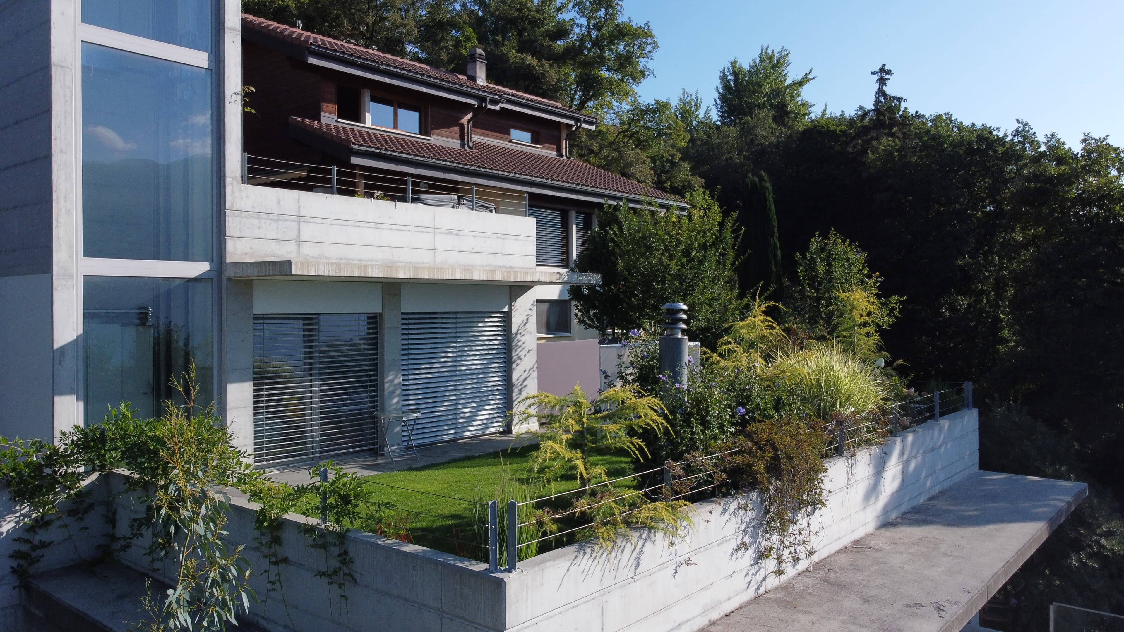 Façade et jardin en terrasse