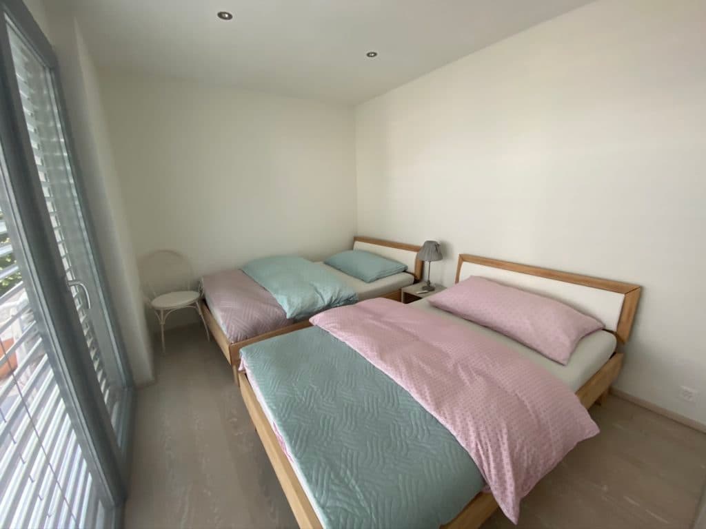 Chambre avec deux lits simples